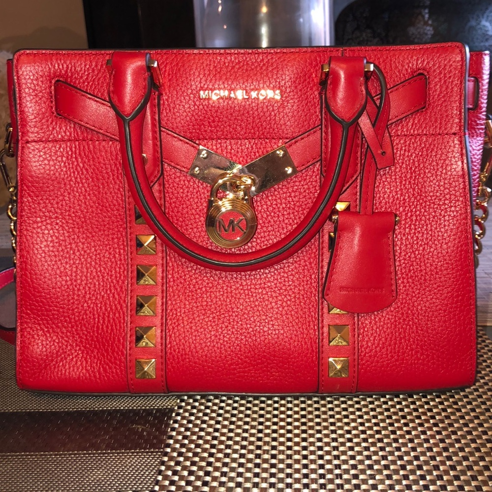 Sold  $95.00 on another site. Michael Kors bag
